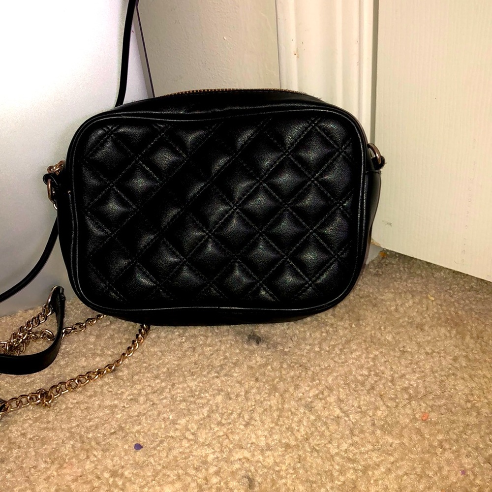 Black purse good for only small things